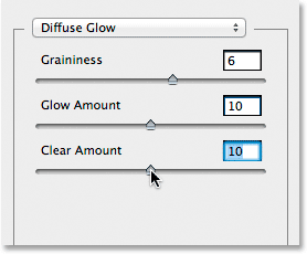 Setting the optons for the Diffuse Glow filter in the Filter Gallery in Photoshop. Image © 2013 Photoshop Essentials.com