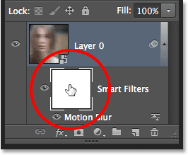 Selecting the Smart Filter mask in the Layers panel. Image © 2013 Photoshop Essentials.com