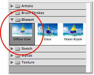 Selecting Diffuse Glow from the Distort filter category. Image © 2012 Photoshop Essentials.com.