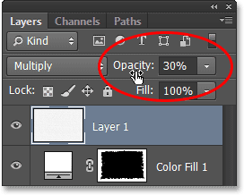 Lowering the layer opacity. Image © 2013 Photoshop Essentials.com