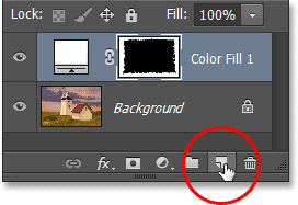 Clicking the New Layer icon in the Layers panel. Image © 2013 Photoshop Essentials.com