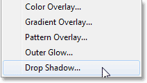 Choosing a Drop Shadow layer style. Image © 2013 Photoshop Essentials.com