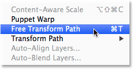 Selecting the Free Transform Path command from the Edit menu. Image © 2014 Photoshop Essentials.com