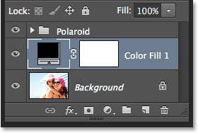 The Layers panel showing the new Solid Color fill layer. Image © 2014 Photoshop Essentials.com