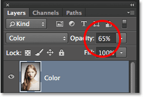 Lowering the opacity of the Color layer. Image © 2014 Photoshop Essentials.com