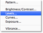 Adding a Levels adjustment layer to the document. Image © 2013 Photoshop Essentials.com