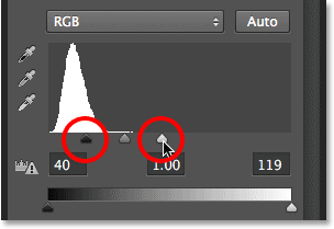 Re-adjusting the black point and white point sliders in Levels. Image © 2013 Photoshop Essentials.com