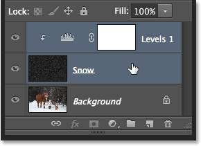 Selecting the top two layers in the Layers panel. Image © 2013 Photoshop Essentials.com