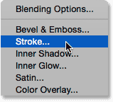 Choosing a Stroke layer effect. Image © 2014 Photoshop Essentials.com.