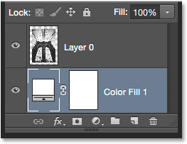 The fill layer now sits below the image layer. Image © 2014 Photoshop Essentials.com.