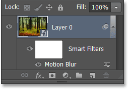 The Layers panel showing the Motion Blur Smart Filter. Image © 2013 Photoshop Essentials.com