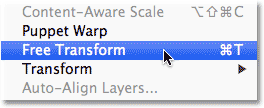 Selecting the Free Transform command from the Edit menu. Image © 2013 Photoshop Essentials.com.
