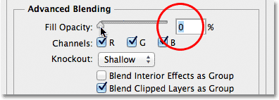 Setting the Fill Opacity option to 0 in the Layer Style dialog box. Image © 2013 Photoshop Essentials.com.