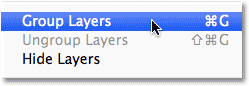 Selecting the Group Layers command from the Layer menu. Image © 2013 Photoshop Essentials.com.