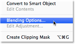 Select Blending Options from the Layers panel menu. Image © 2014 Photoshop Essentials.com.