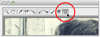 Selecting the Radial Filter in the Camera Raw Filter in Photoshop CC. Image © 2013 Photoshop Essentials.com