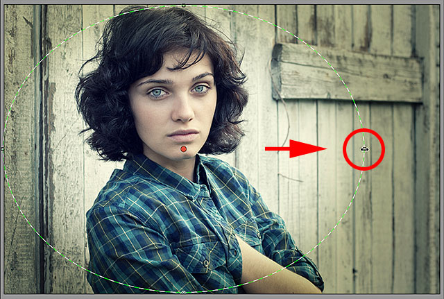Resizing the Radial Filter shape in the Camera Raw dialog box. Image © 2013 Photoshop Essentials.com