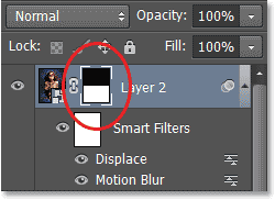 The Layers panel showing the layer mask thumbnail. Image © 2013 Photoshop Essentials.com