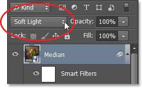 Changing the blend mode of the Median layer to Soft Light. Image © 2013 Photoshop Essentials.com