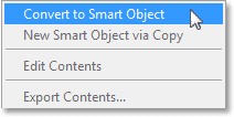 Choosing the Convert to Smart Object command from the Layer menu. Image © 2013 Photoshop Essentials.com