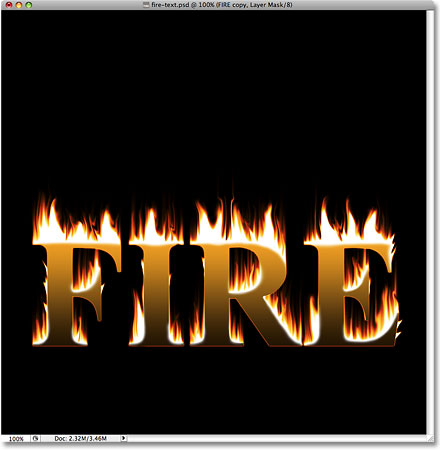 The text and the flames now appear blended together. Image © 2009 Photoshop Essentials.com.