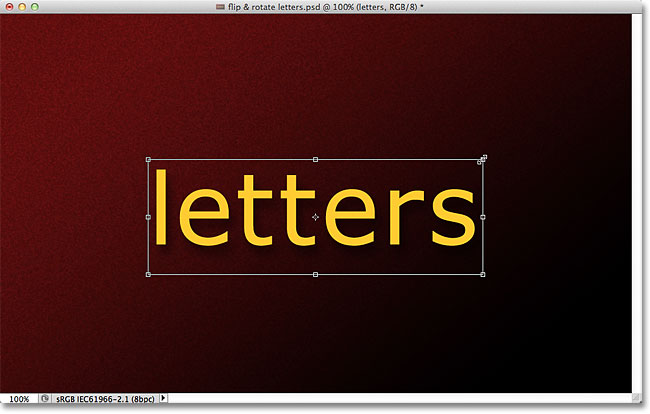 Scaling text in Photoshop with the Free Transform command. Image © 2011 Photoshop Essentials.com.
