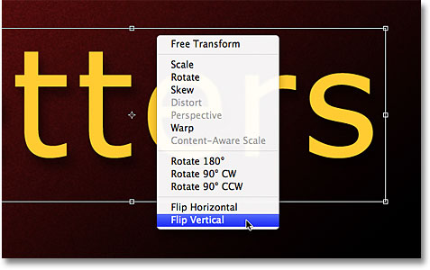 Selecting the Flip Vertical command from the Free Transform contextual menu. Image © 2011 Photoshop Essentials.com.