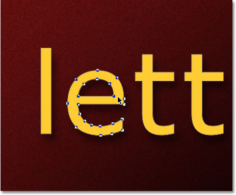 Selecting the letter 'e' in the word with the Path Selection Tool. Image © 2011 Photoshop Essentials.com.