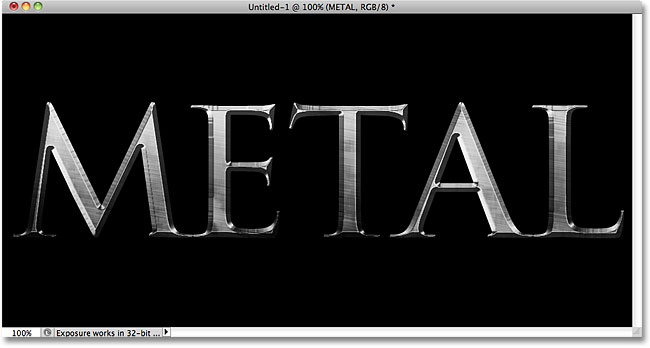 The metal text effect using Trajan Pro Bold. Image © 2010 Photoshop Essentials.com.