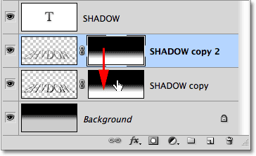Copying the layer mask onto the layer below it. Image © 2010 Photoshop Essentials.com.
