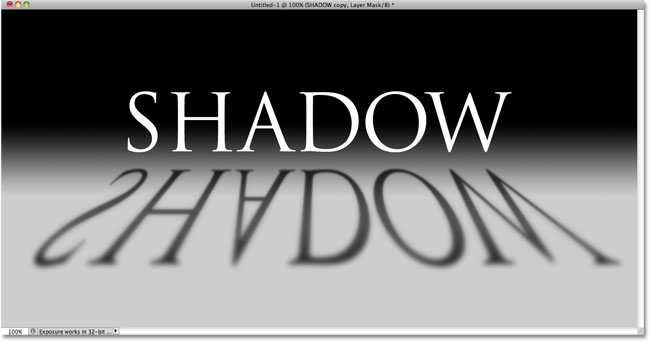The text shadow after inverting the layer mask. Image © 2010 Photoshop Essentials.com.