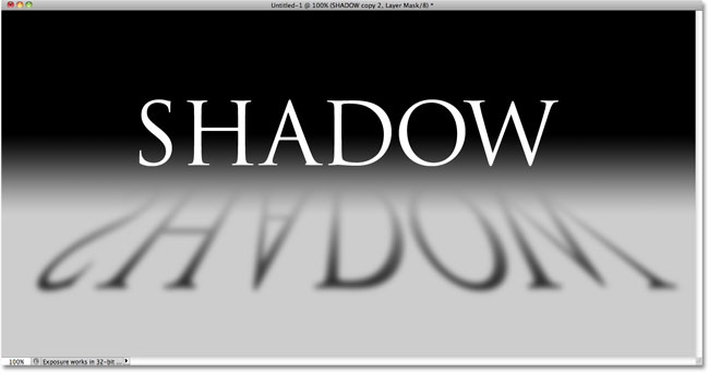 The shadow now fades into view thanks to the gradient on the layer mask. Image © 2010 Photoshop Essentials.com.