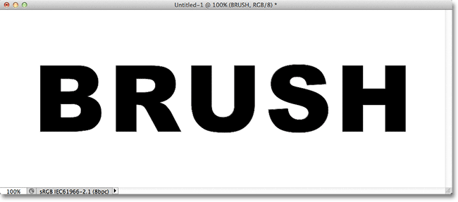 The original Photoshop document containing the word 'Brush' on a Type layer. Image © 2011 Photoshop Essentials.com