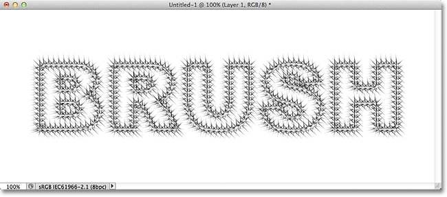 The starburst text stroke now appears darker after applying the brush a second time. Image © 2011 Photoshop Essentials.com