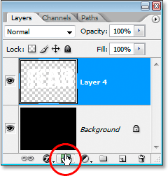 Clicking the 'Add Layer Mask' icon at the bottom of the Layers palette.